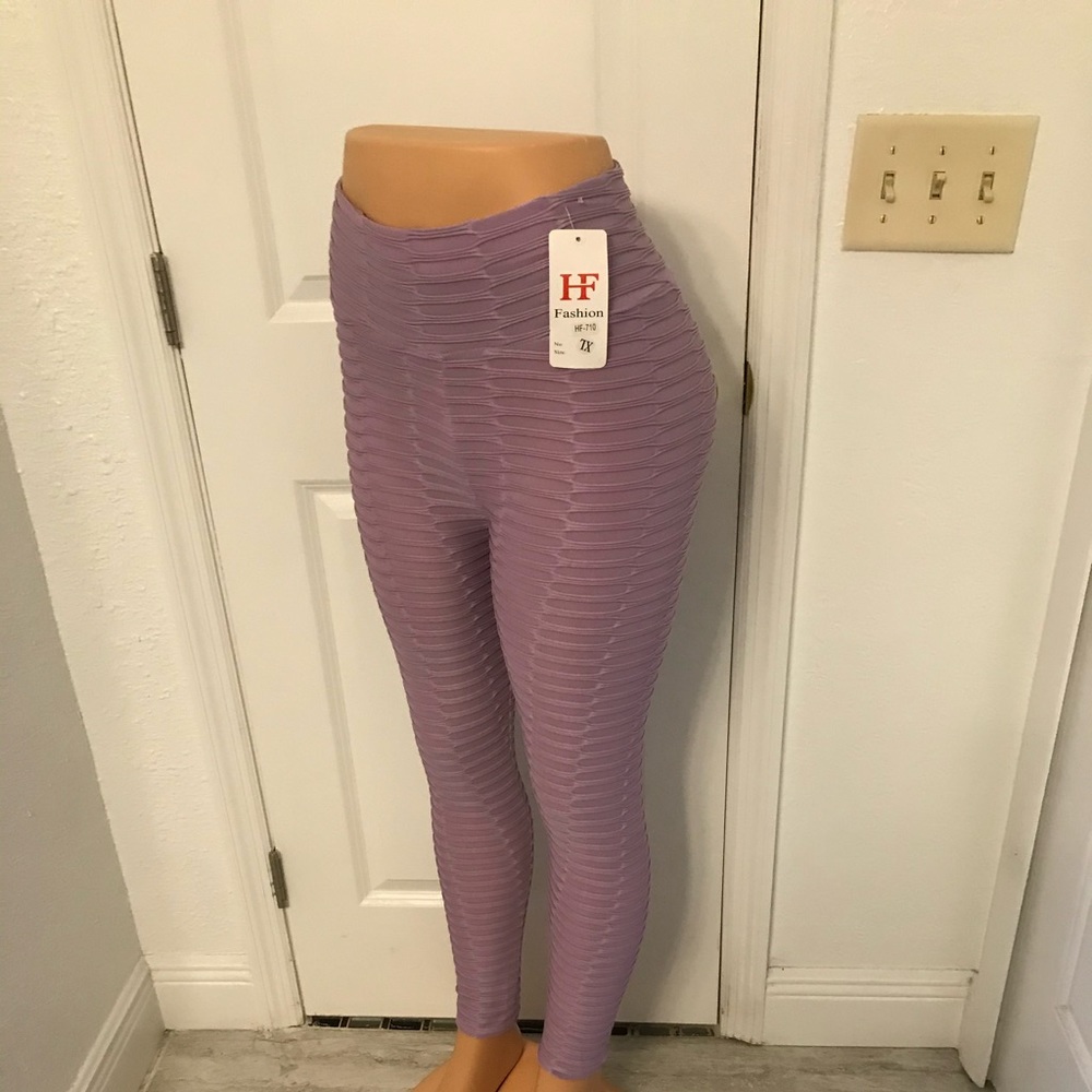 BRAN NEW PURPLE TIGHT SIZE XL